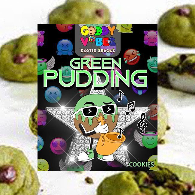 A green pudding is on the table next to some cookies.