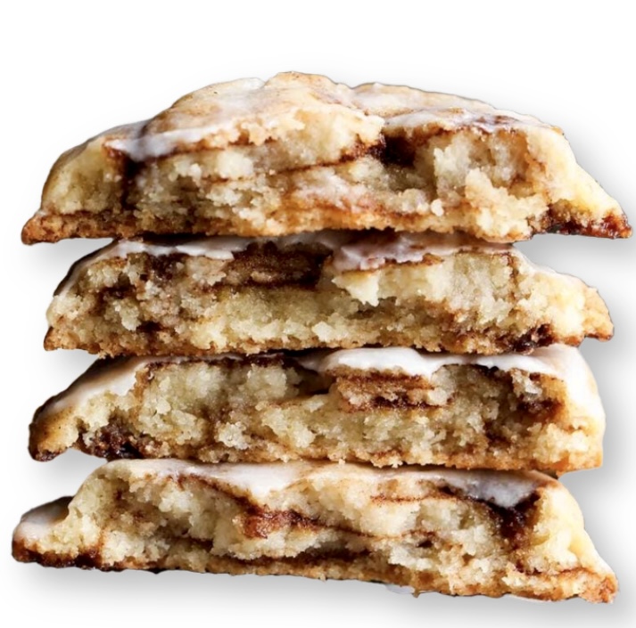 A stack of four cookies with icing on top.