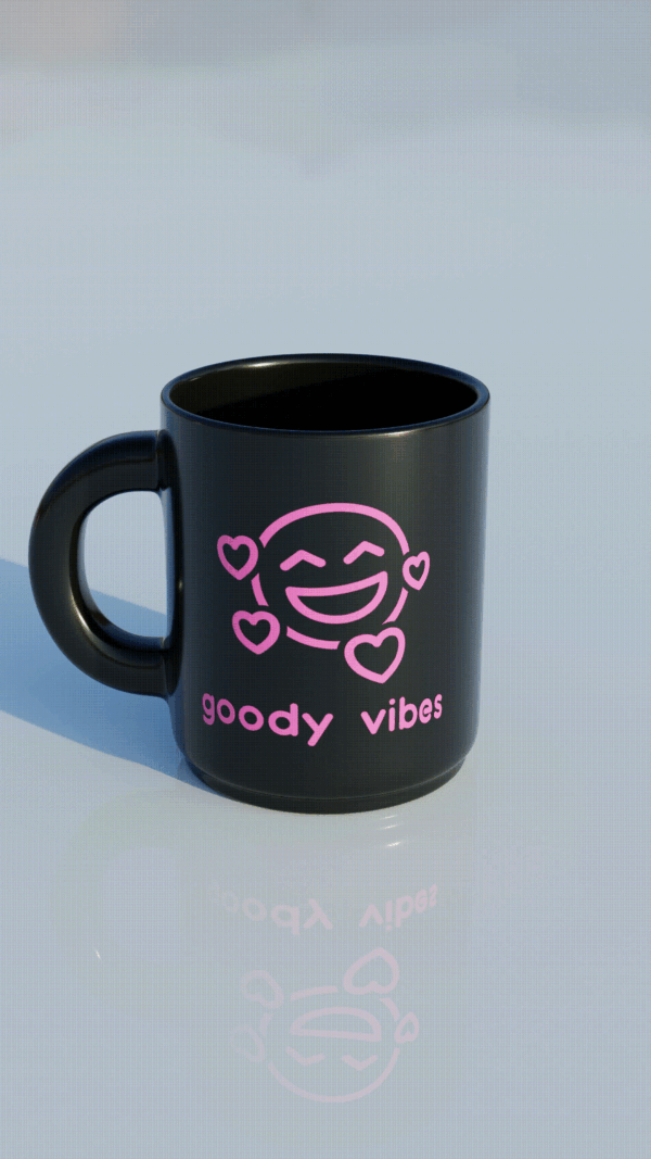 A black coffee mug with the words " goody vibes ".