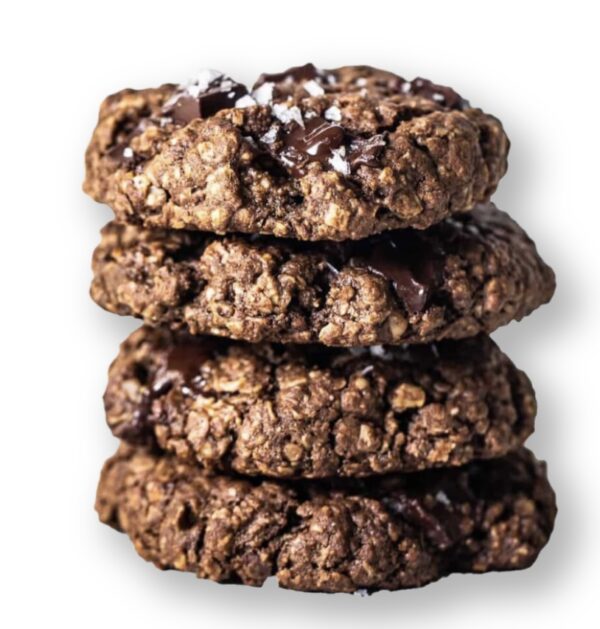 A stack of cookies with chocolate chips on top.