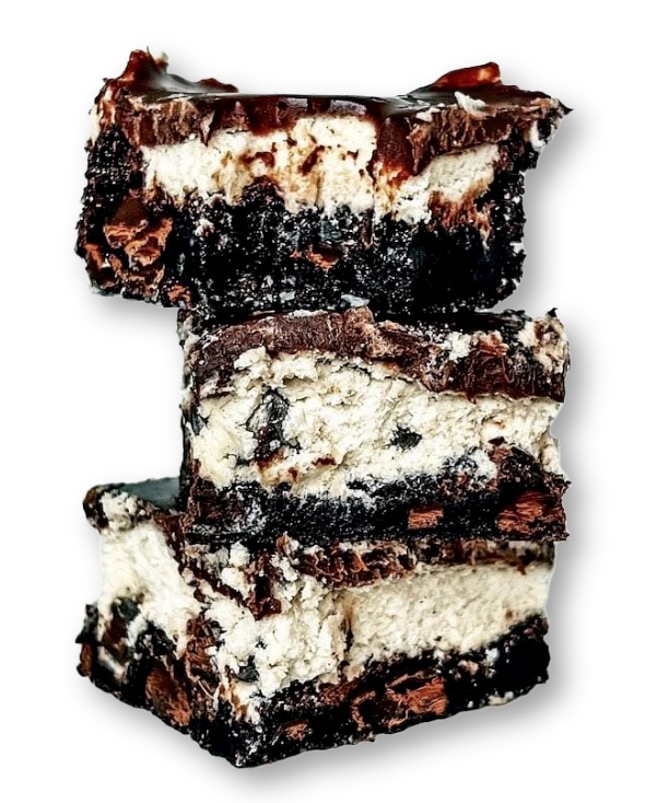 Three pieces of ice cream cake stacked on top of each other.