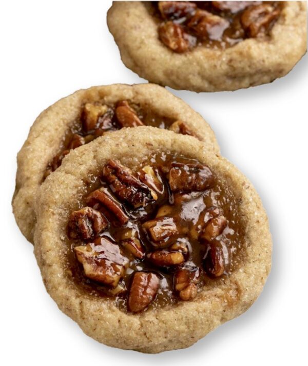 A close up of some cookies with nuts