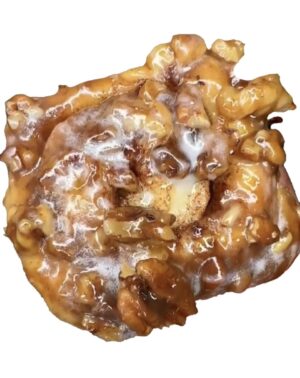 A close up of a pastry with nuts and caramel