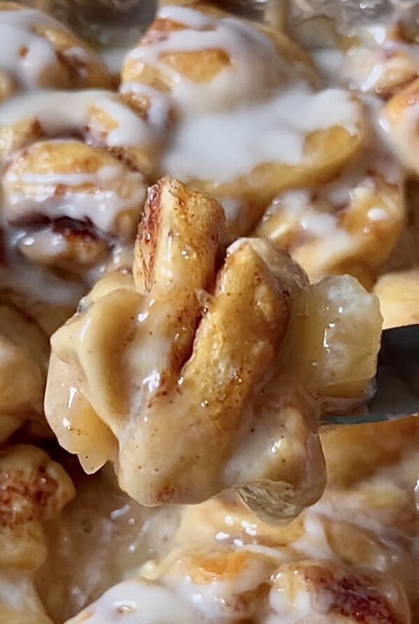 A close up of some nuts with white icing
