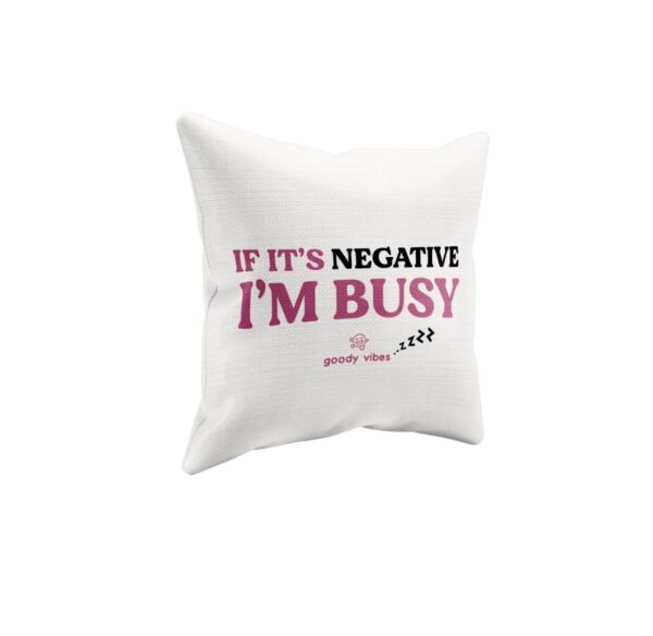 A pillow with the words if it's negative i 'm busy written on it.